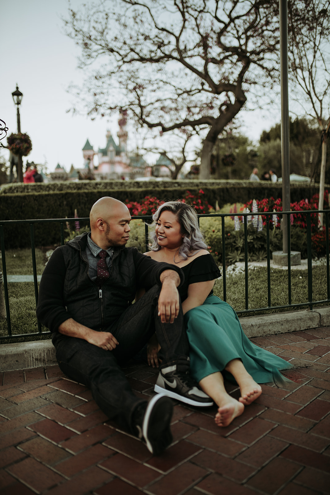 After hours of walking around Disneyland and California Adventure, we needed a break and found a nice little patch of brick to sit on.